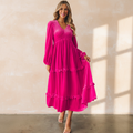 Rose red shirred V neck long sleeve velvet dress on a warm ivory boutique studio background