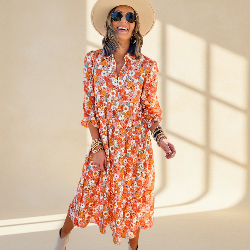Multicolor boho floral collared long sleeve ruffled dress on a warm ivory boutique studio background
